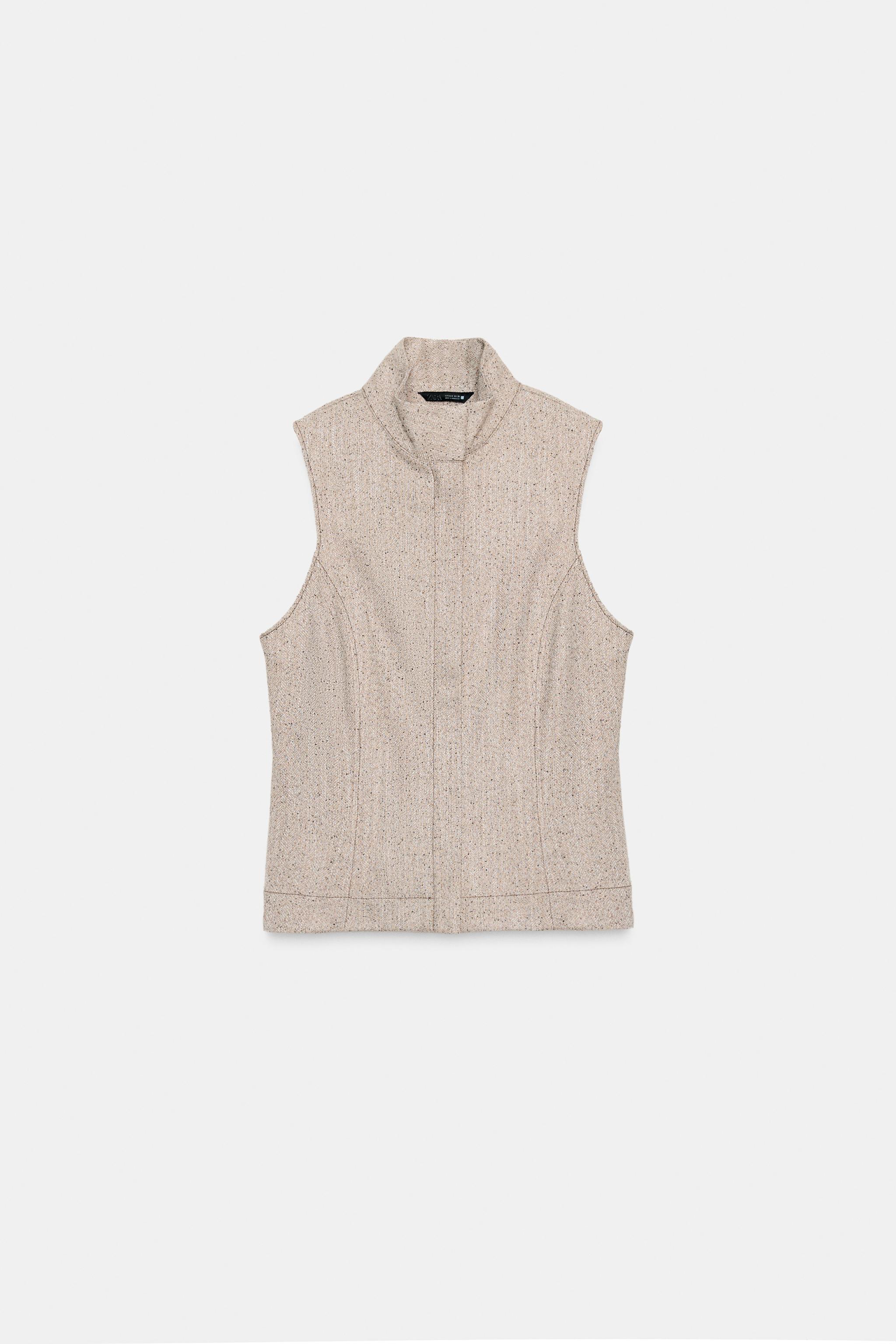 TOP SANS MANCHES À COL MONTANT